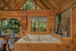 Tina de hidromasaje y toallas 