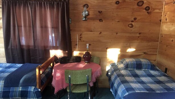 Unclassified image, 1 of 12, button - Charming Lakefront Cabin Rental with a Fire Pit near Brownville, Maine (Brownville)