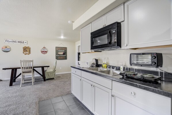 Fridge, microwave, coffee/tea maker, toaster