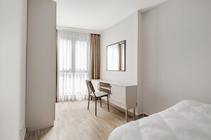 1 غرفة نوم ومكواة/لوح كي وواي فاي مجانًا وملاءات أسرّة