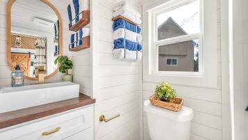 Hair dryer, towels, soap, shampoo