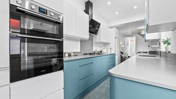 Fridge, oven, toaster, cookware/dishes/utensils