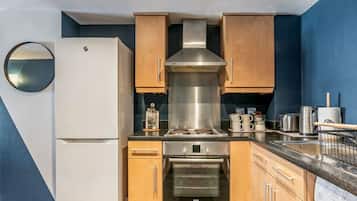 Fridge, microwave, oven, cookware/dishes/utensils