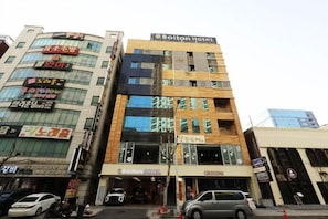 A multi-story building with a prominent 'Bolton Hotel' sign. - Bolton Hotel (Gwangju)