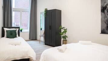 1 dormitorio, tabla de planchar con plancha, wifi gratis y ropa de cama