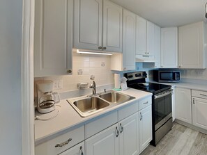 Fridge, microwave, oven, stovetop - Flip Flop Oasis | Beach Bungalow w/Modern Comforts (Ormond Beach)