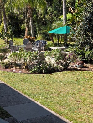 Outdoor dining - Boho Haven - Stylish 1BR King Condo, Upstairs Retreat - Clothing Optional (Lutz)