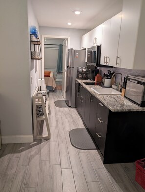 Fridge, microwave, stovetop, coffee/tea maker - Boho Haven - Stylish 1BR King Condo, Upstairs Retreat - Clothing Optional (Lutz)