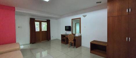 Family Room | Blackout drapes, iron/ironing board