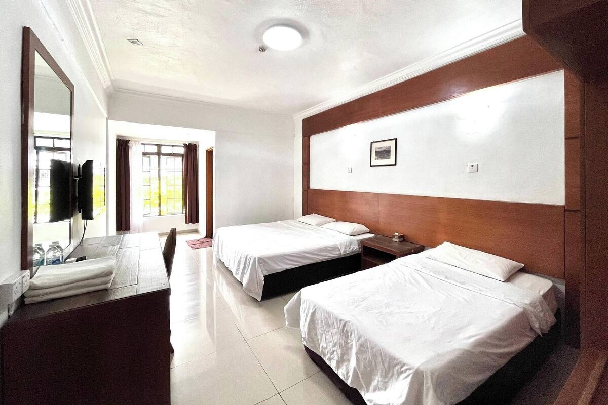 Family Room | Blackout drapes, iron/ironing board