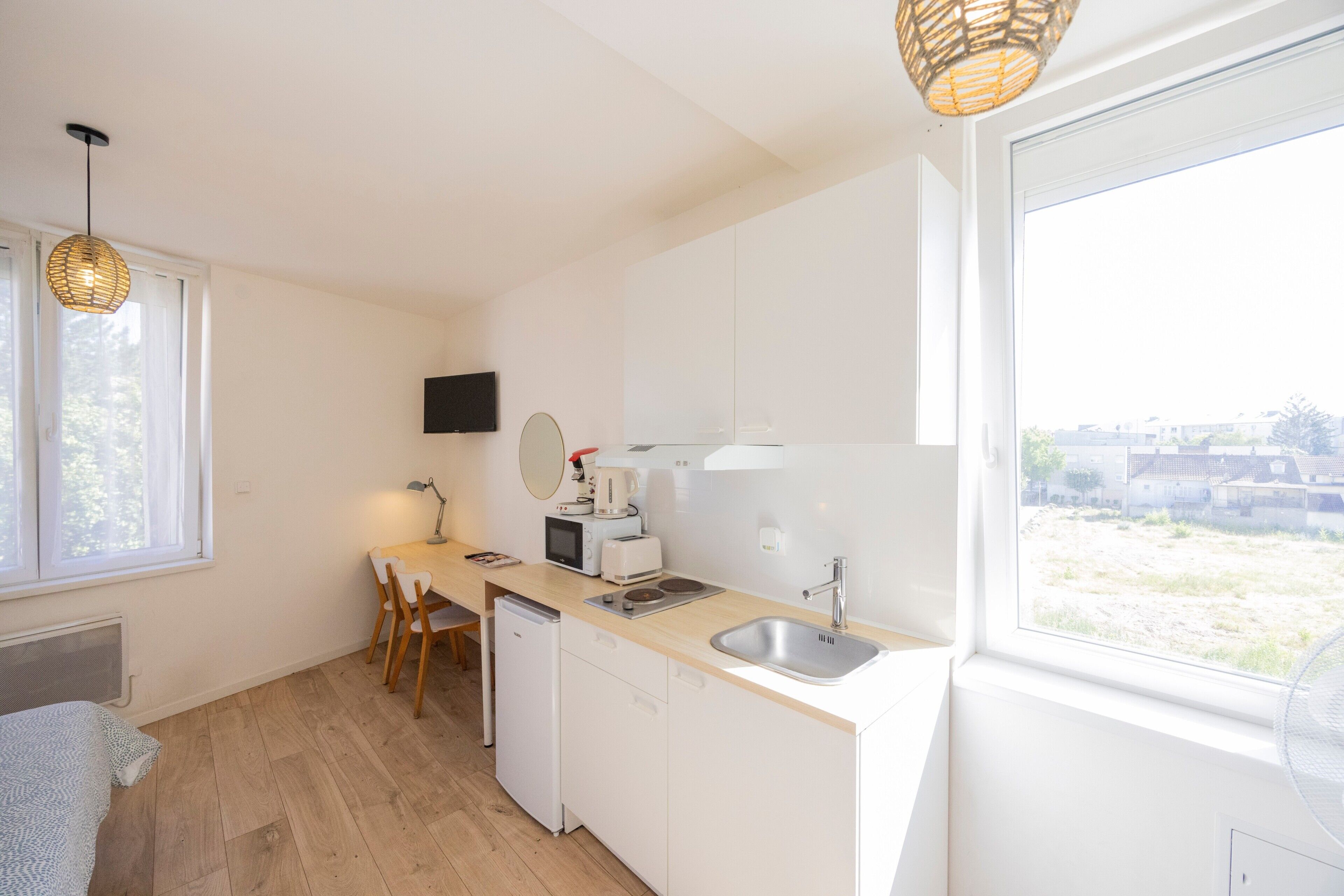 Fridge, microwave, stovetop, coffee/tea maker