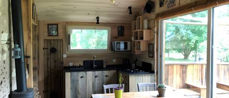 Fridge, microwave, stovetop, coffee/tea maker