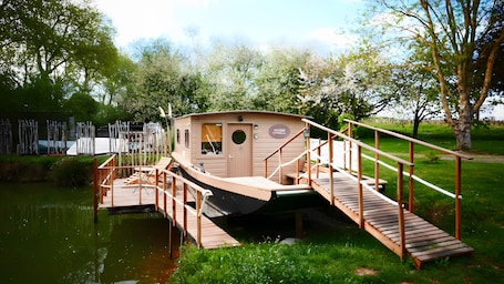 Exterior. Houseboat Cabin by the Water's Edge