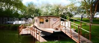 Houseboat Cabin by the Water's Edge