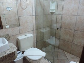 Basic Double Room, City View | Bathroom | Separate tub and shower, hair dryer, slippers, towels