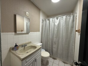 Hair dryer, towels, soap, toilet paper