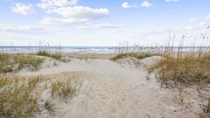 A sandy beach path leading to the sea, surrounded by grass and dunes. - Amelia Island Beach Bungalow Directly on the Beach - Upstairs unit (Fernandina Beach)