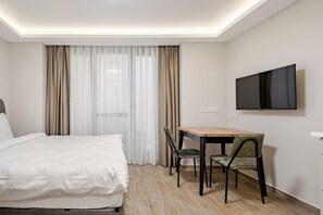 1 dormitori, planxa i posts de planxar, wifi gratuïta i roba de llit