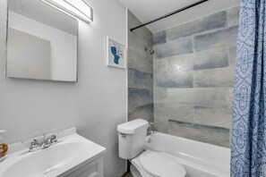 Hair dryer, towels, soap, shampoo