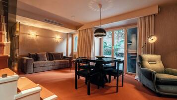 Suite de lujo, cocina básica | Zona de estar