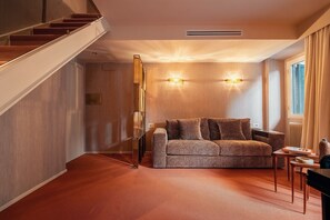 Suite de lujo, cocina básica | Zona de estar