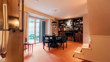 Suíte superluxo, 1 quarto, cozinha americana | Área de estar