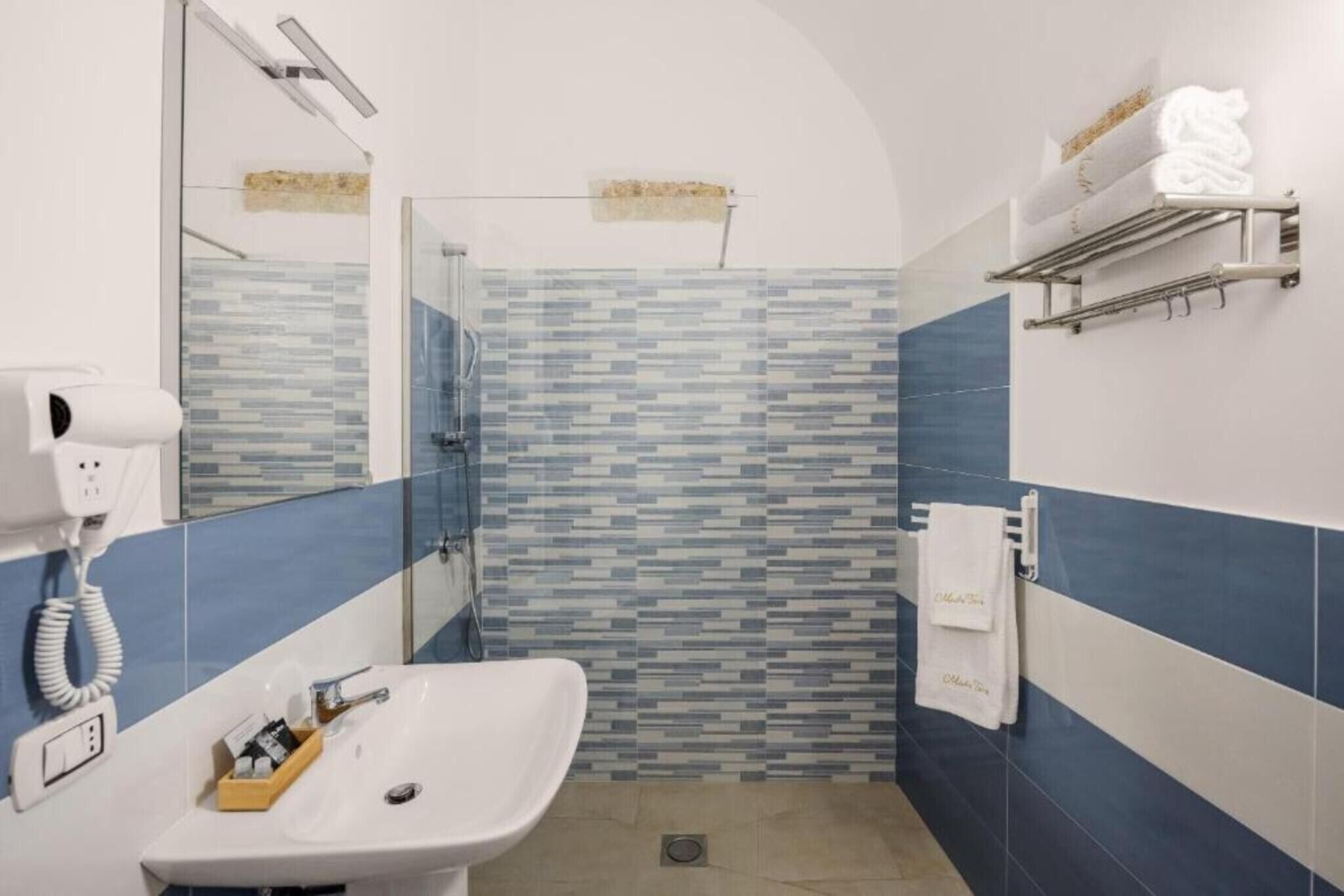 Doccia, asciugacapelli, asciugamani