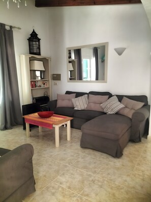 TV, fireplace - Villa 'Abrils' with Sea Views, Private Pool and Wi-Fi (Cala en Porter)