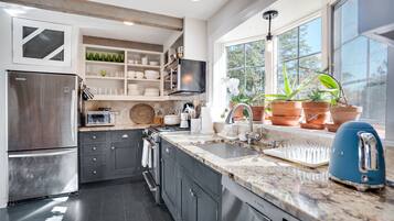 Microwave, stovetop, coffee/tea maker, toaster