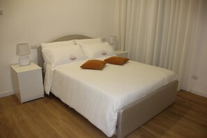 1 غرفة نوم ومكواة/لوح كي وواي فاي وملاءات أسرّة