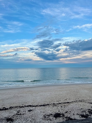 A beach with a clear sky and calm sea. - ELEGANT COTTAGE LESS THAN 2 MILES TO OCEAN (Vero Beach)