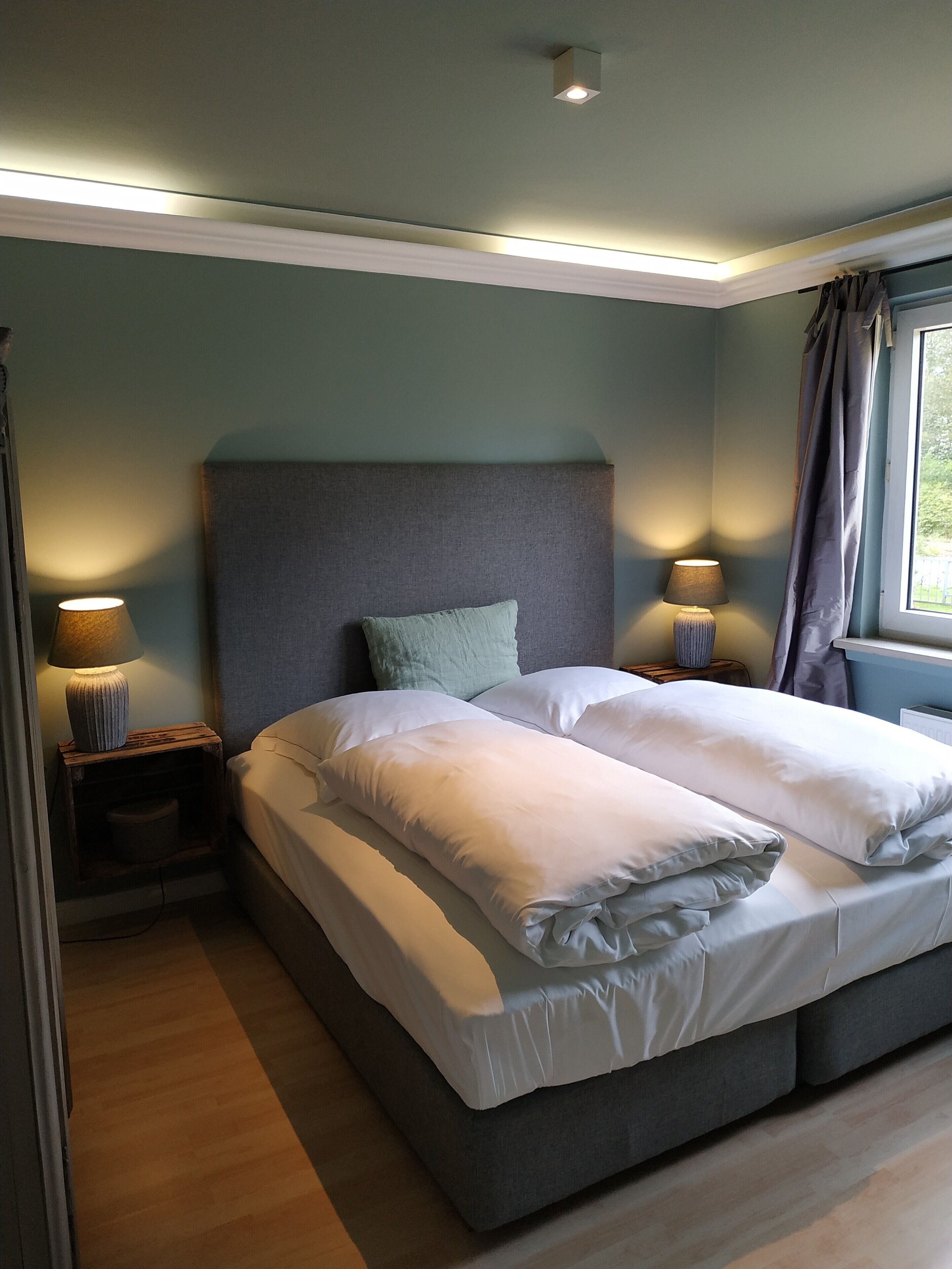 1 slaapkamer, een strijkplank/strijkijzer, wifi, beddengoed