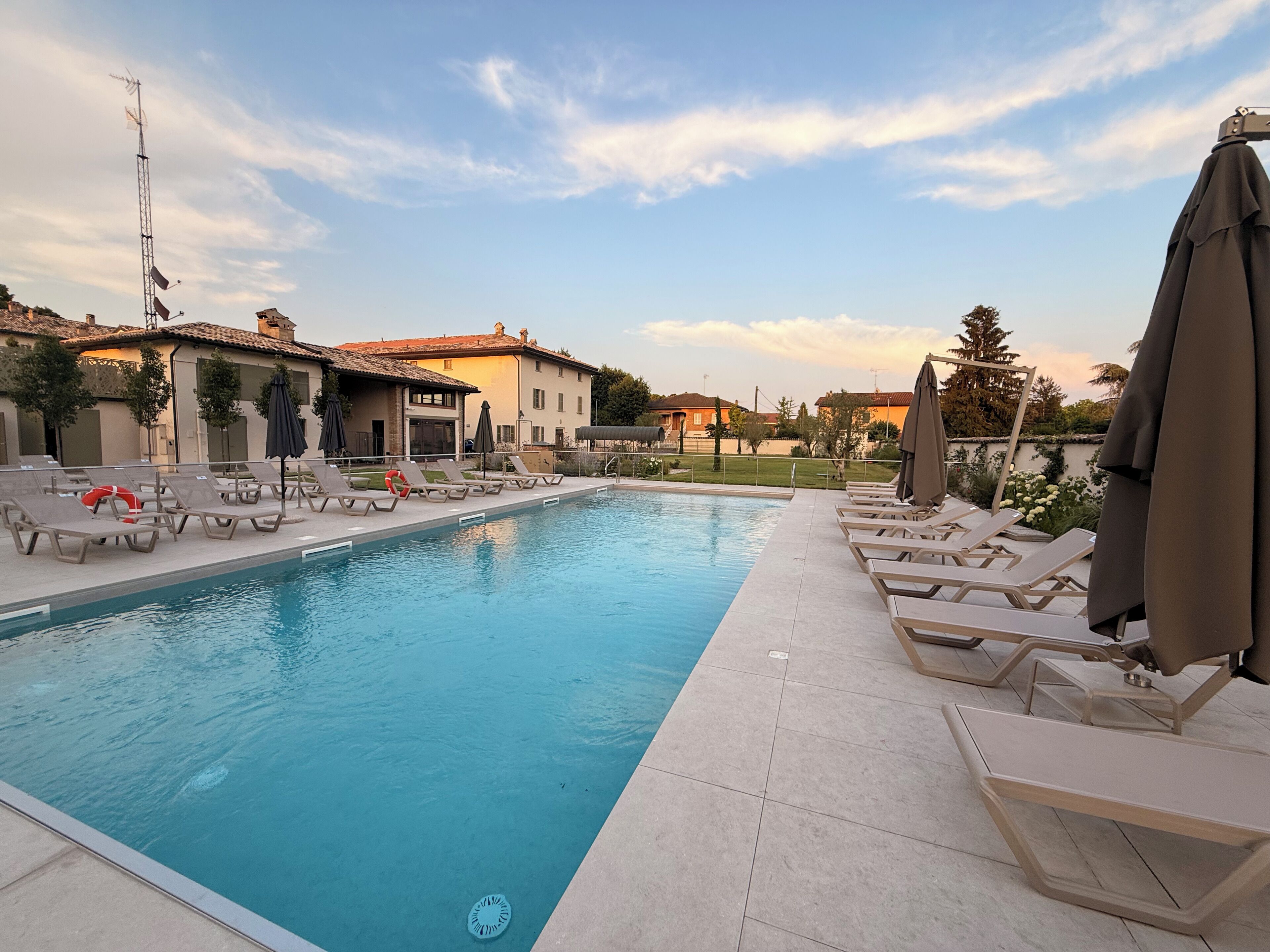 Seasonal outdoor pool, pool umbrellas, pool loungers