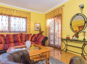 House (Holiday Home Marin AS with Pool) | Living room | 32-inch flat-screen TV with satellite channels