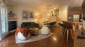 Smart TV, fireplace, books, video library