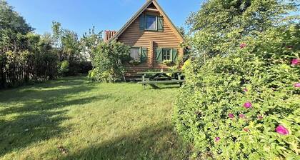 Summer house made of wooden beams