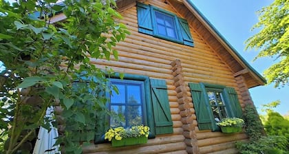 Summer house made of wooden beams