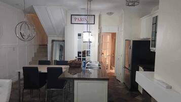 Coffee/tea maker, fridge, microwave, oven