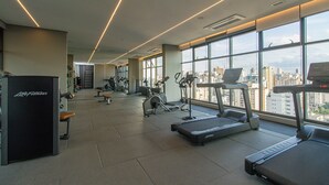 A modern gym with treadmills, stationary bikes, and weight machines. - Elegance and Comfort - Close to Allianz Parque Sp-p2202b (São Paulo)