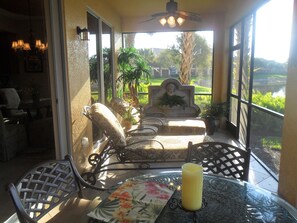 Outdoor dining - SERENE VIEWS FROM 24' Lanai view lake/golf ,  coach home 1st floor. (Bonita Springs)
