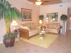 Living area - SERENE VIEWS FROM 24' Lanai view lake/golf ,  coach home 1st floor. (Bonita Springs)