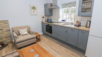 Rentaplats i utensilis de cuina, vaixella i coberteria