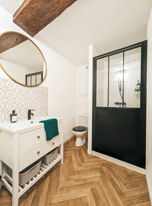 Shower, hair dryer, towels, soap