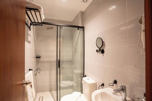 Hair dryer, towels, soap, shampoo