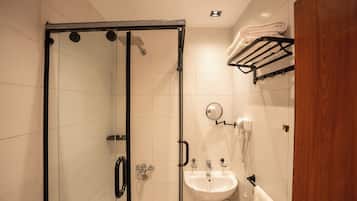 Hair dryer, towels, soap, shampoo