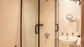 Hair dryer, towels, soap, shampoo