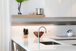 Fridge, microwave, oven, stovetop - Long Bay Paradise | Luxury Stay Steps from the Beach & Lagoon | Pool & Spa (Long Bay Hills)