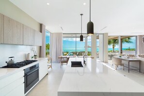Fridge, microwave, oven, stovetop - Long Bay Gem | Oceanfront Villa w/ Pool & Lagoon Access | Amazing Marine Life (Long Bay Hills)