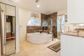 Shower, jetted bath, hair dryer, towels