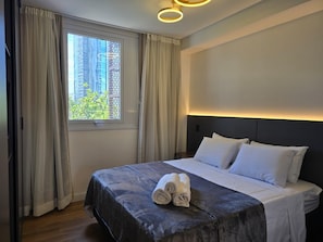 Studio Comfort | Ruang kerja ramah laptop, Wi-Fi gratis, dan seprai linen